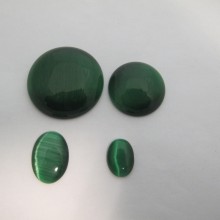 Green glass cat's eye cabochons