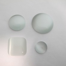 White glass cat's eye cabochons