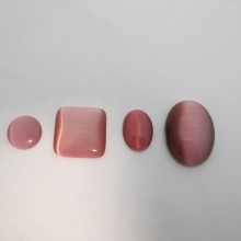 Pink glass cat's eye cabochons