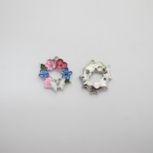 10 Pendentifs/breloques fleur en métal 23mm