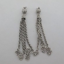 Fancy silver metal tassels with small leaves