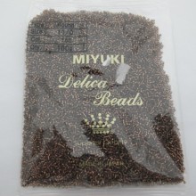 100 GRS MIYUKI DELICA 11/0 DB0150 SILVER LINED ROOT BEER