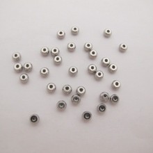100 pcs perles rondelles 4x2.5x1.2mm acier inox