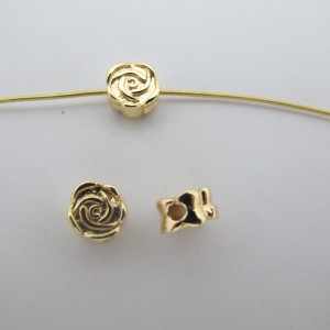10 pcs Rose gold beads 7x4 mm