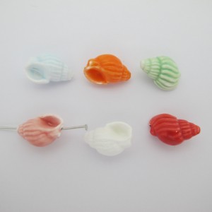 10 perles en Céramique coquillage 13x21mm