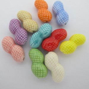 10 perles en Céramique cacahuète 10x21mm