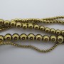Hematite ronde doré- Fil de 40cm
