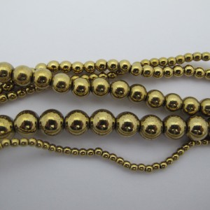 Round golden hematite - 40cm strand
