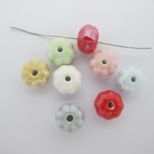 10 perles citrouille 7x10mm en Céramique